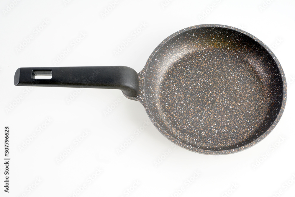 frying pan over white background frying pan over white background