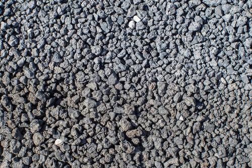 asphalt texture. asphalt road. stone asphalt texture background granite gravel
