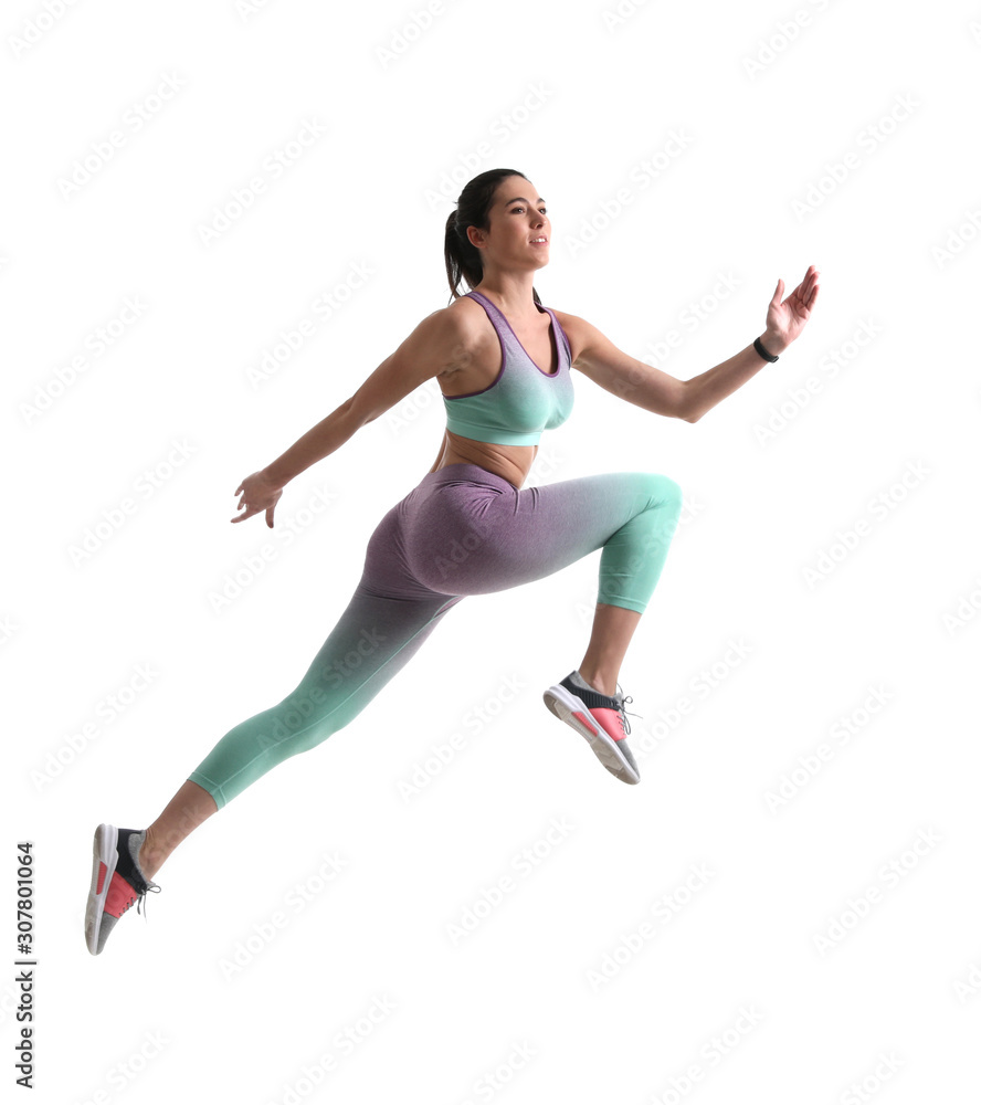 Athletic young woman running on white background, side view