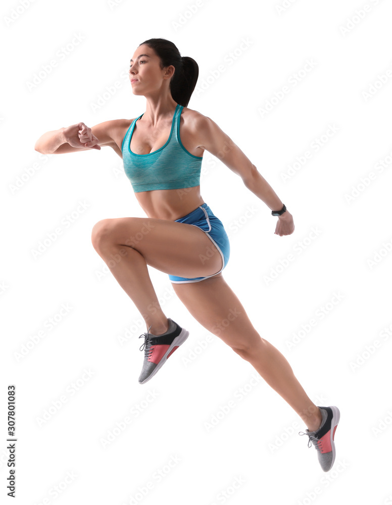 Athletic young woman running on white background, side view