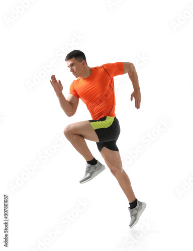 Athletic young man running on white background, side view © New Africa