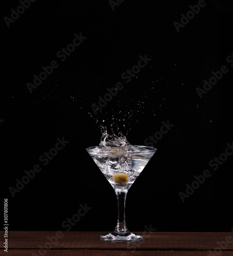 in a Martini glass olive flies