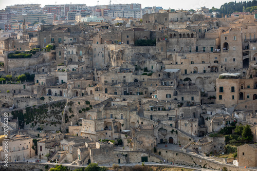 Panoramic view of Sassi di Matera a historic district in the city of Matera, well-known for their ancient cave dwellings from the Belvedere di Murgia Timone, Basilicata, Italy