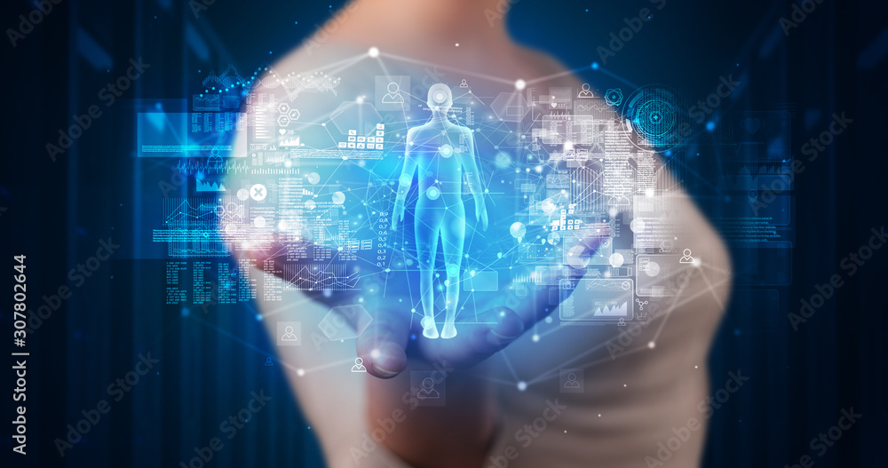 Young person holding hologram projection displaying health related graphs and symbols