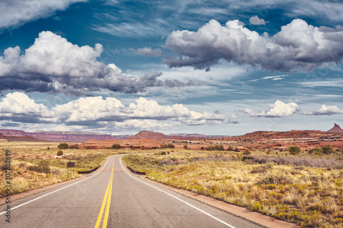 Scenic road in Canyonlands National Park, color toning applied, Utah, USA.