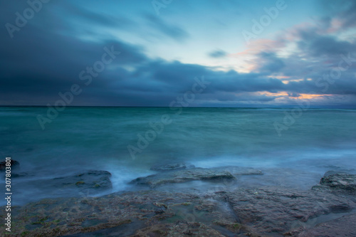 Snow Clouds Over Ocean, Winter Sunset © It4All
