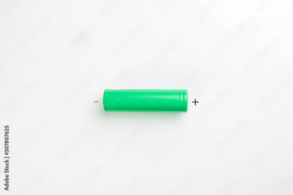single green 18650 small hand tool battery with positive and negative poles identified on a white background single green 18650 small hand tool battery with positive and negative poles identified on a white background