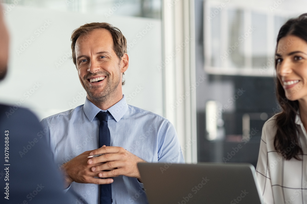 © Rido - Business people laughing during meeting © Rido - Business people laughing during meeting