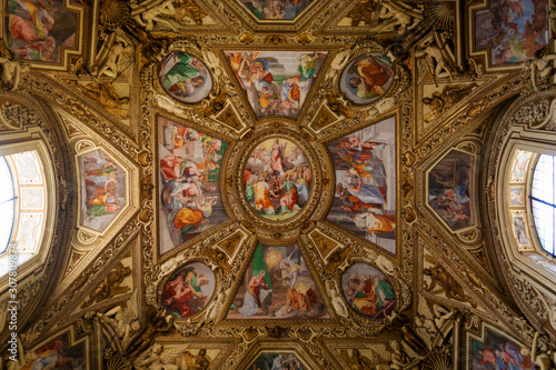 Painted ceiling icons in renaissance style in the Basilica of Santa Maria in Trastevere, Rome, Italy