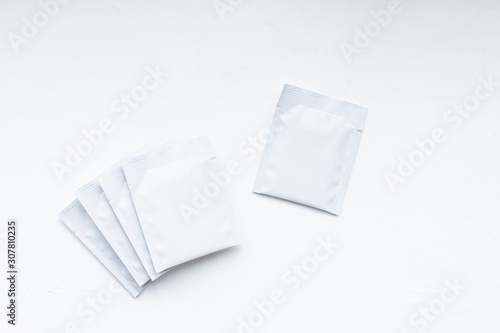 Teabag pack copyspace mockup advertising design. Tea pack on white background. White tea sachet mock up.
