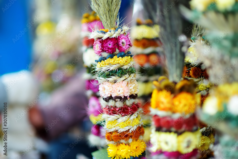 Fototapeta premium Traditional Lithuanian Easter palms known as verbos sold on Easter market in Vilnius, Lithuania