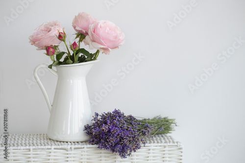 Purple rose and lavender bouquet for the bride on her special day.