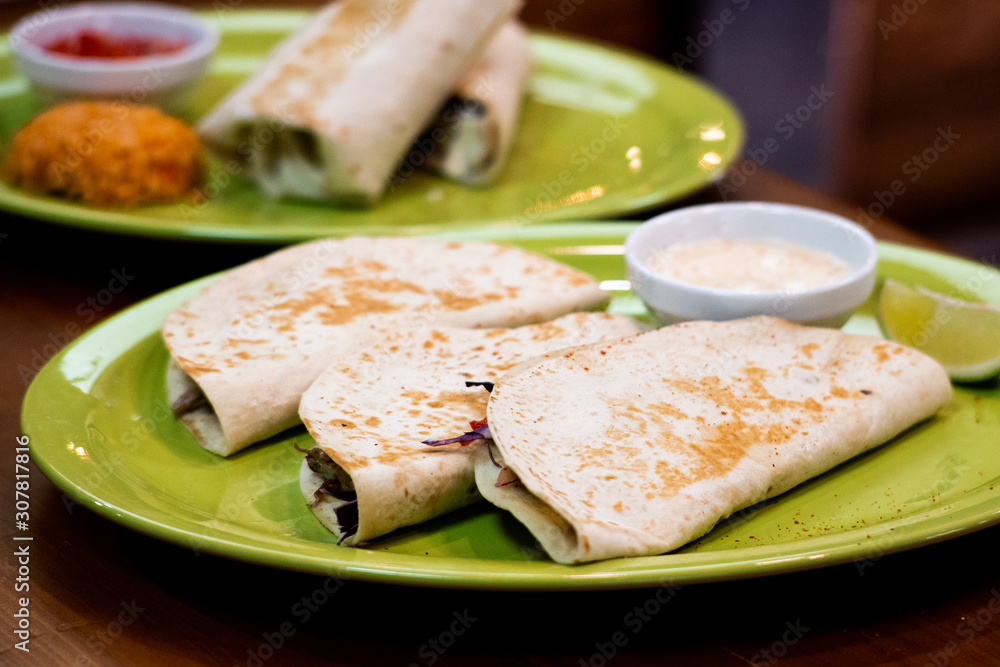 Mexican food - delicious tacos with ground beef Mexican food - delicious tacos with ground beef
