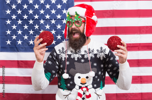 Cheerful mood. Christmas tradition from USA. Xmas and new year. Tradition of patriotism. My country and tradition. Decor and accessory. Man wear knitted sweater. American tradition. Santa Claus © be free