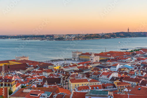 Sunset view of cityscape of Lisbon with Praca do Comercio square, Portugal photo