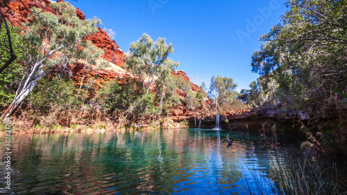 View of the waterfall at Fern Pool in Dales Gorge, Karijini National Park, Western Australia. photo