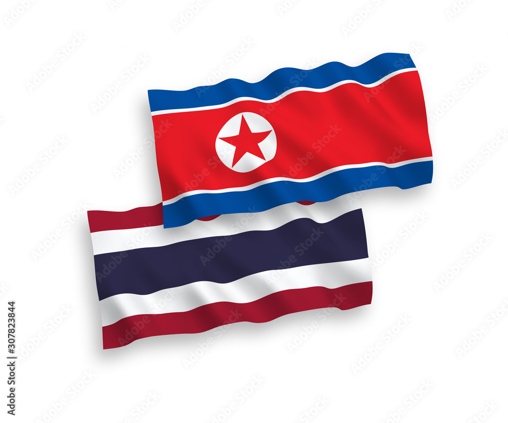 National vector fabric wave flags of North Korea and Thailand isolated on white background. 1 to 2 proportion.