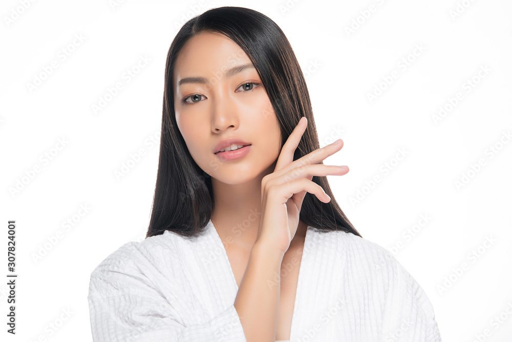 Beautiful Young Asian Woman with Clean Fresh Skin. Face care, Facial treatment, on white background, Beauty and Cosmetics Concept. Beautiful Young Asian Woman with Clean Fresh Skin. Face care, Facial treatment, on white background, Beauty and Cosmetics Concept.