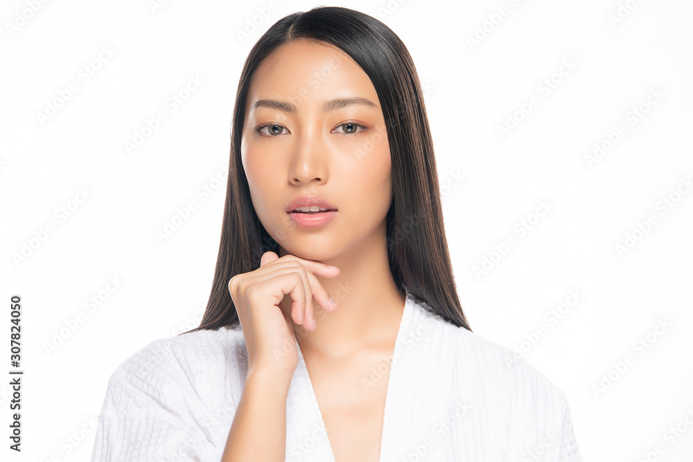 Beautiful Young Asian Woman with Clean Fresh Skin. Face care, Facial treatment, on white background, Beauty and Cosmetics Concept. Beautiful Young Asian Woman with Clean Fresh Skin. Face care, Facial treatment, on white background, Beauty and Cosmetics Concept.