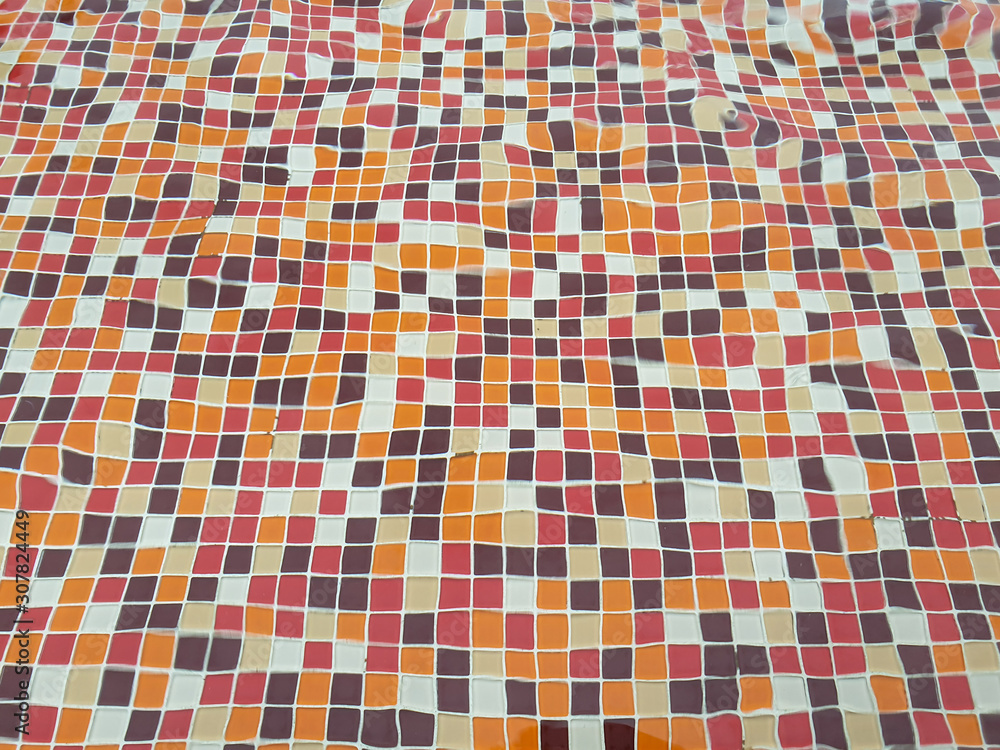 Fototapeta premium Swimming pool bottom caustics ripple and flow with waves.