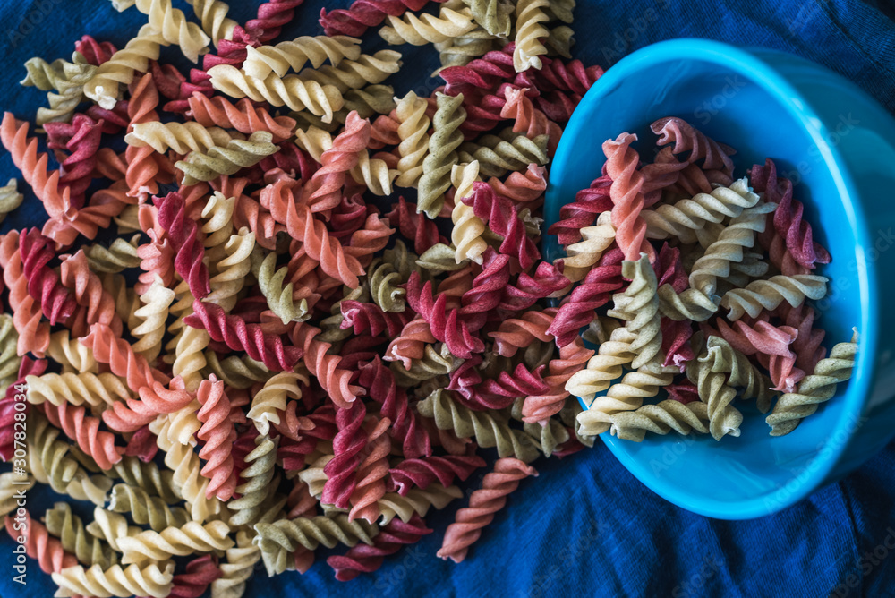  vegetarian pasta on a dark classic blue background copy space