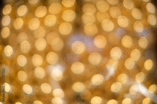 Gold blur abstract background. bokeh christmas blurred beautiful shiny Christmas lights, Christmas background concept...