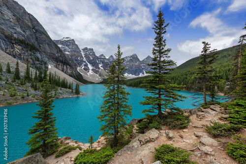 Moraine lake in Canadian Rockies and dramatic clouds, Banff National Park, Canada