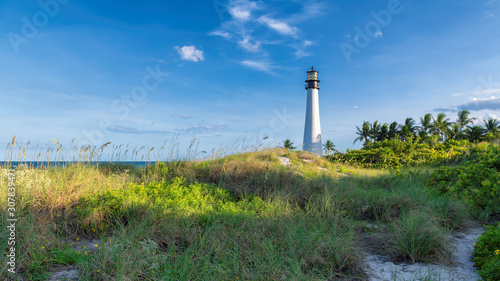 Cape Florida Lighthouse at sunset on beautiful beach, Miami, Florida, USA