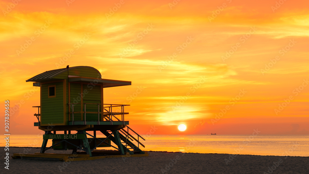 Sunrise at South Miami Beach, Florida. Tropical beach and life guard tower, Miami Beach, Florida. Sunrise at South Miami Beach, Florida. Tropical beach and life guard tower, Miami Beach, Florida.
