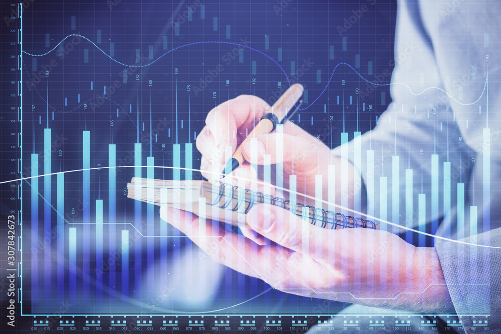 Double exposure hands with stock market chart. Double exposure hands with stock market chart.