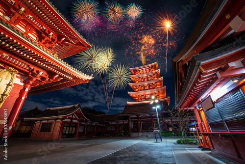 Firework over Sensoji temple at night in Asakusa, Tokyo, Japan.