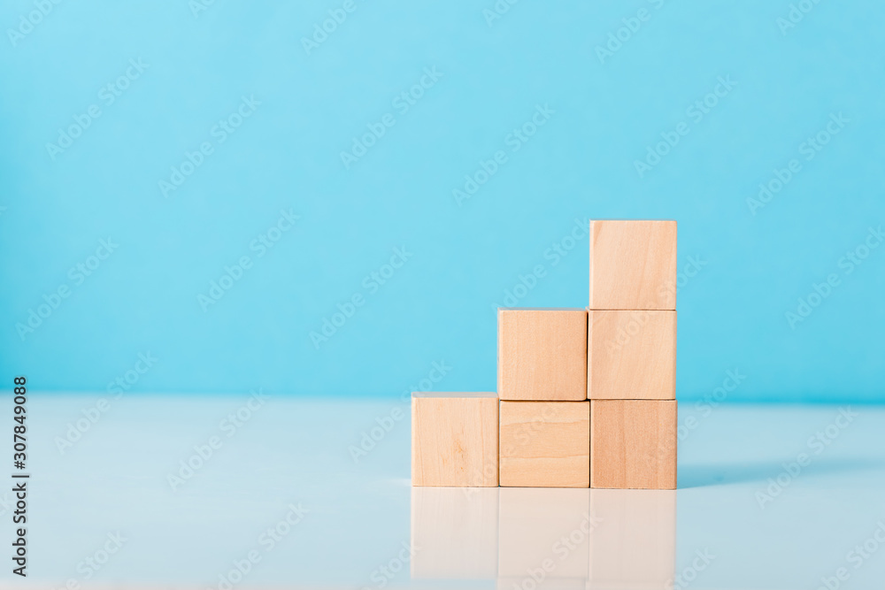 wooden cubes on blue with copy space wooden cubes on blue with copy space