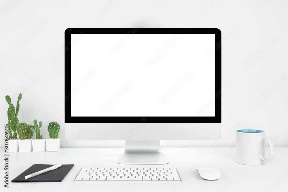 Computer with blank white copy space for text, Mockup design desktop computer in office on white table with keyboard and Coffee cub, Work place concept, Cactus in pot. Computer with blank white copy space for text, Mockup design desktop computer in office on white table with keyboard and Coffee cub, Work place concept, Cactus in pot.