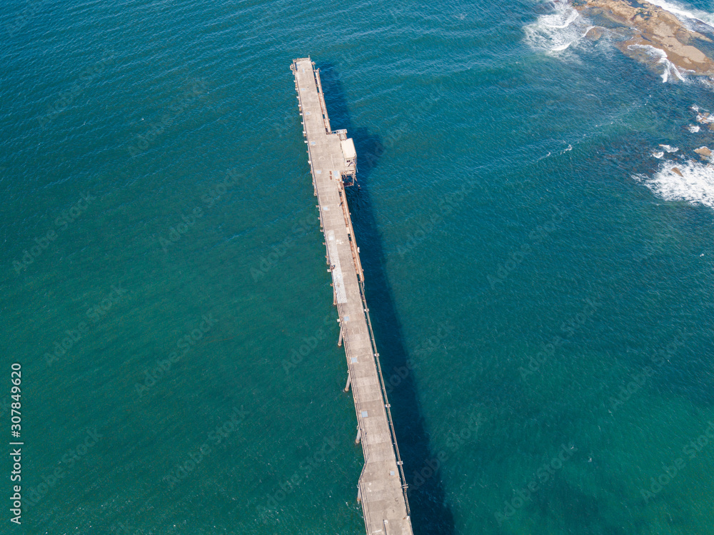 Aerial view of pier on the ocean. Aerial view of pier on the ocean.