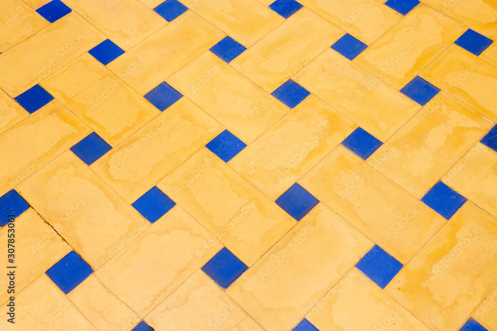Ceramic mosaic pattern.Colorful blue and yellow background. Ceramic mosaic close up. Ceramic mosaic close up. Andalusian ceramic wall. Ceramic mosaic pattern.Colorful blue and yellow background. Ceramic mosaic close up. Ceramic mosaic close up. Andalusian ceramic wall.