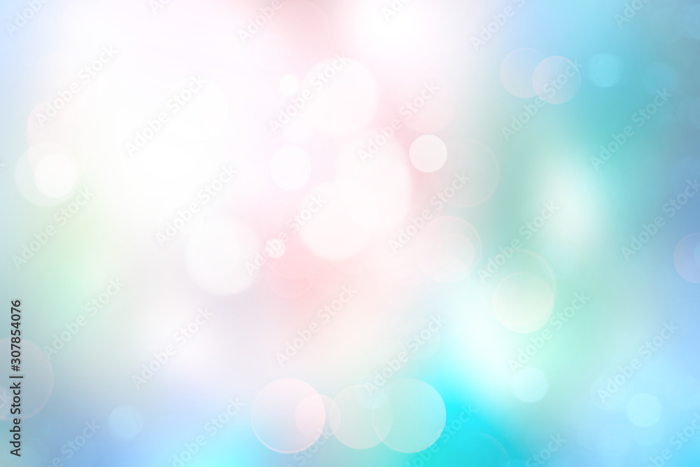 Colorful pink green blue blurred bokeh background.