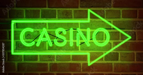 Neon Casino sign with glowing text in Las Vegas or Nevada. Club den for entertainment or gambling Hall - 4k