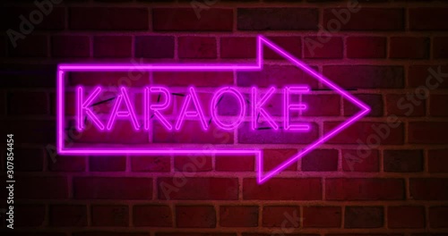 Karaoke neon sign glowing above bar or open mic establishment. Entertainment studio for performing songs or singing - 4k photo