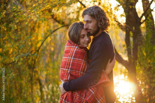 Happy couple outdoors. Outdoor portrait of romantic couple in love. Full of happiness. 