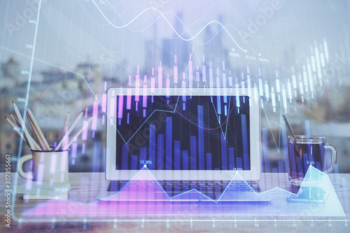 Stock market chart hologram drawn on personal computer background. Multi exposure. Concept of investment.