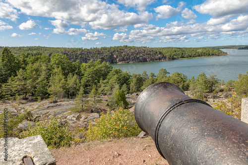 Ancient cast iron cannons, Bomarsund fortress, Sund, Aland Islands, Finland The old ruins of a fortress   Red brick