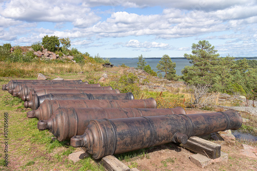 Ancient cast iron cannons, Bomarsund fortress, Sund, Aland Islands, Finland The old ruins of a fortress   Red brick
