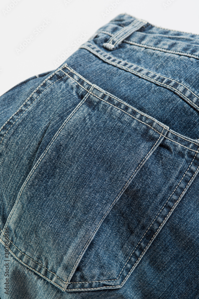 Blue jeans denim fabric texture and background. Blue jeans denim fabric texture and background.
