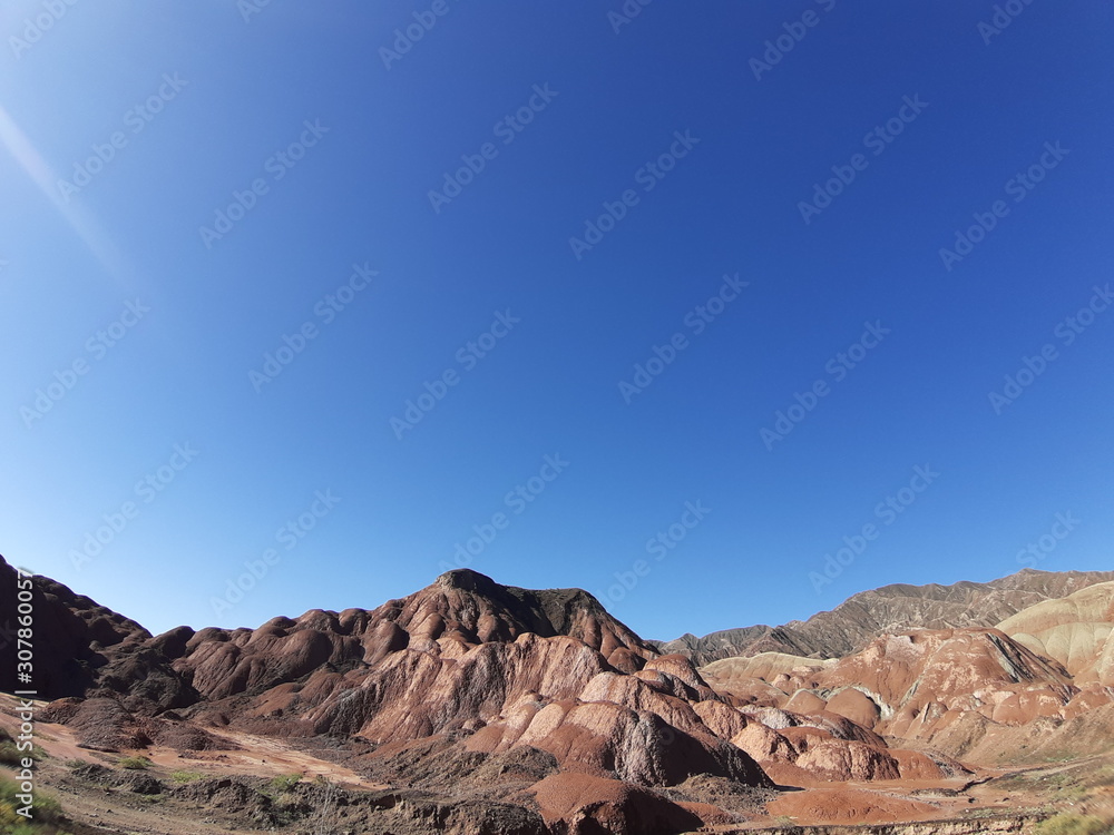 Fototapeta premium Clear blue sky and colorful mountain in the sunny day in summer use as background and nature concept.