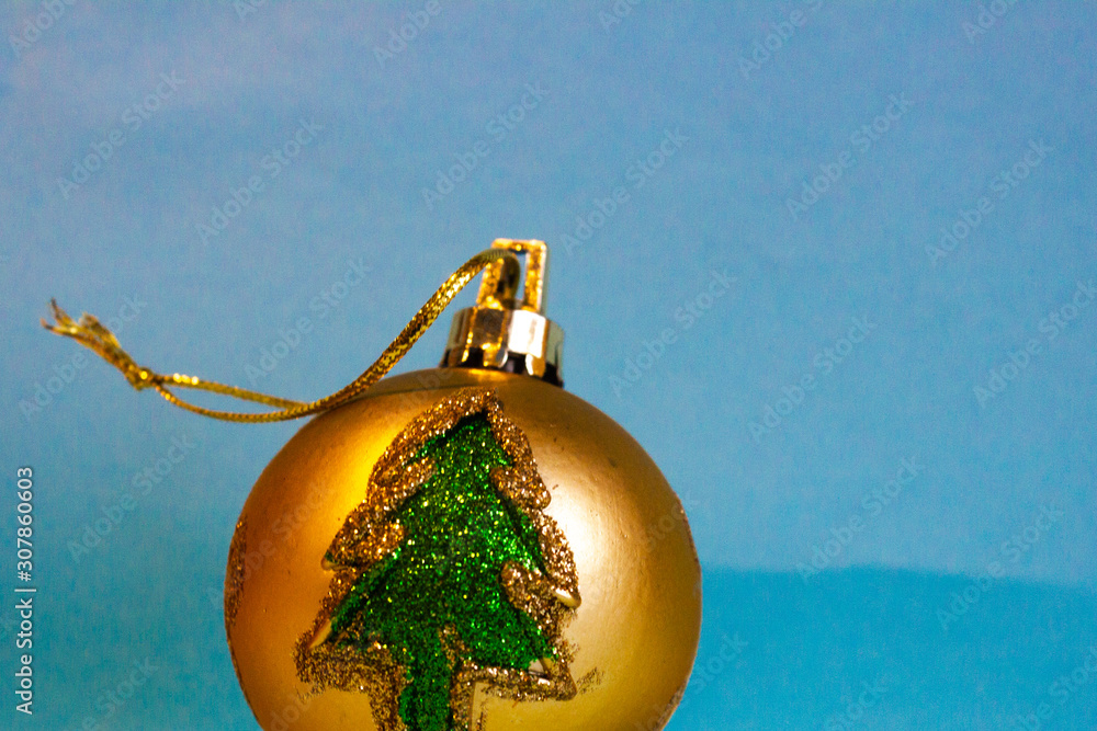  Christmas gold ball on a blue background