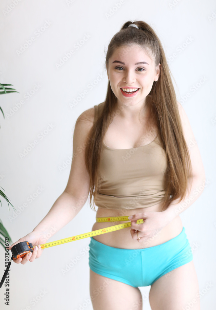 Woman Measures Waist with Measuring Tape Stock Photo - Image of