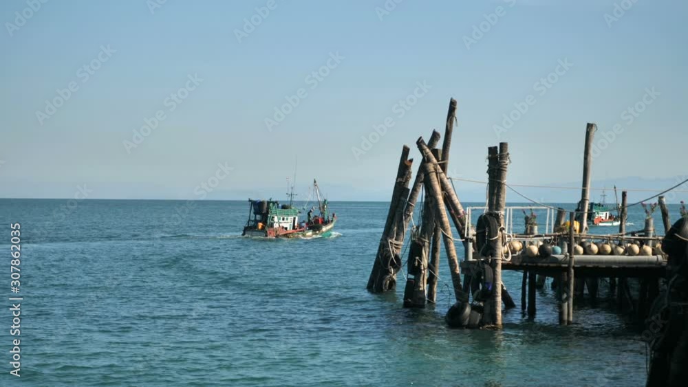 In Thailand a ffishing, water, boat, thailand, sea, nature, asia, tropical, traditional, coast, island, travel, blue, andaman, vacation, thai, landscape, transportation, touriishing boat goes to sea. In Thailand a ffishing, water, boat, thailand, sea, nature, asia, tropical, traditional, coast, island, travel, blue, andaman, vacation, thai, landscape, transportation, touriishing boat goes to sea.