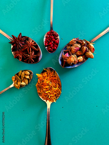 Natural spices top view. Star anise, marigold, cardamom. Modern apothecary