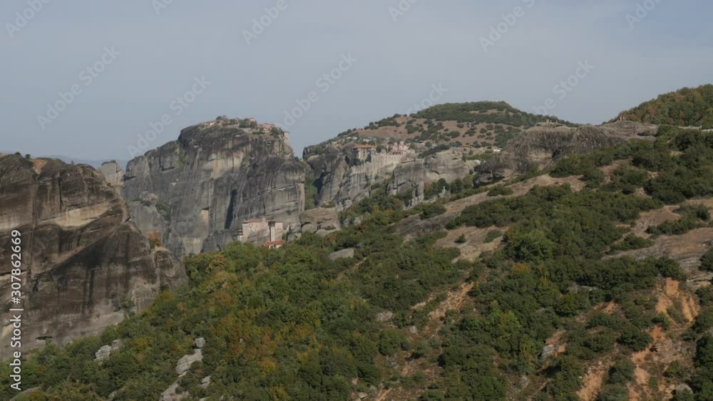 Slow tilt over Great Meteoron Varlaam and Rousanou monasteries of Meteora rocks 4K video Slow tilt over Great Meteoron Varlaam and Rousanou monasteries of Meteora rocks 4K video