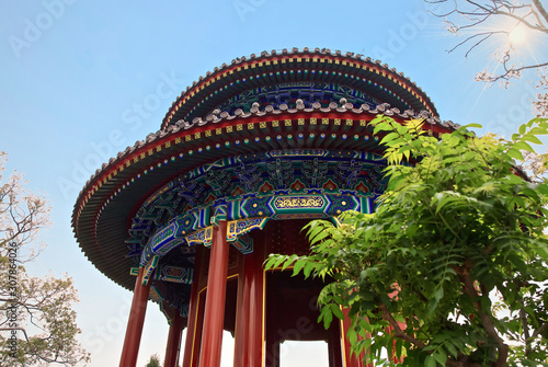 Eye Feasting Pavilion in Jingshan Park. round two-tier roof, pointed to the top. traditional chinese architecture. Pavilion dedicated to the Buddha Amoghavajra